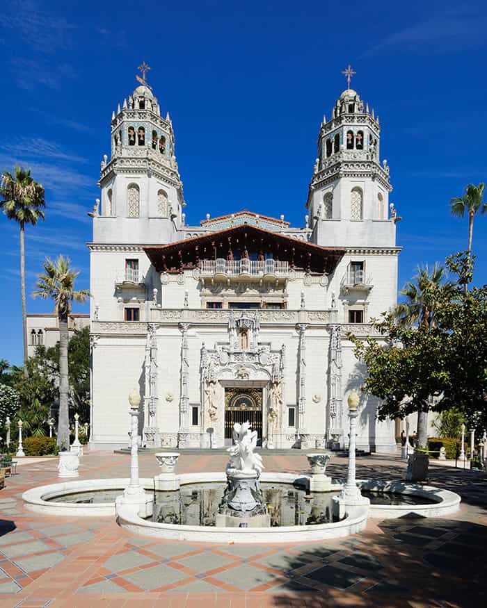 the exterior of hearst castle and its fountain