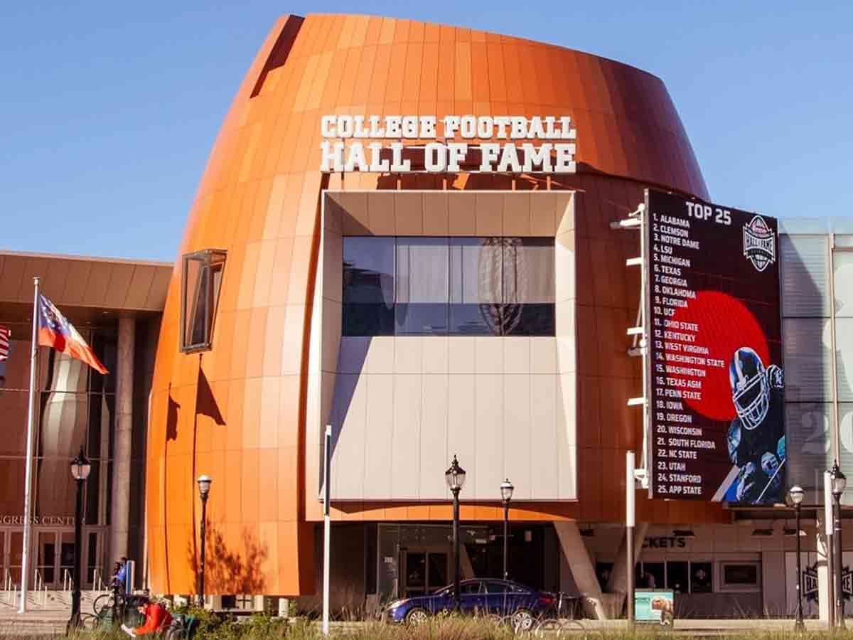 the exterior of the college football hall of fame shaped like a football