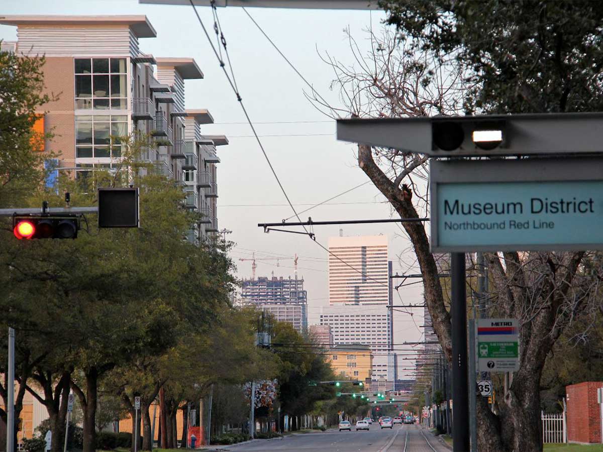 a sign denoting the museum district neighborhood in houston