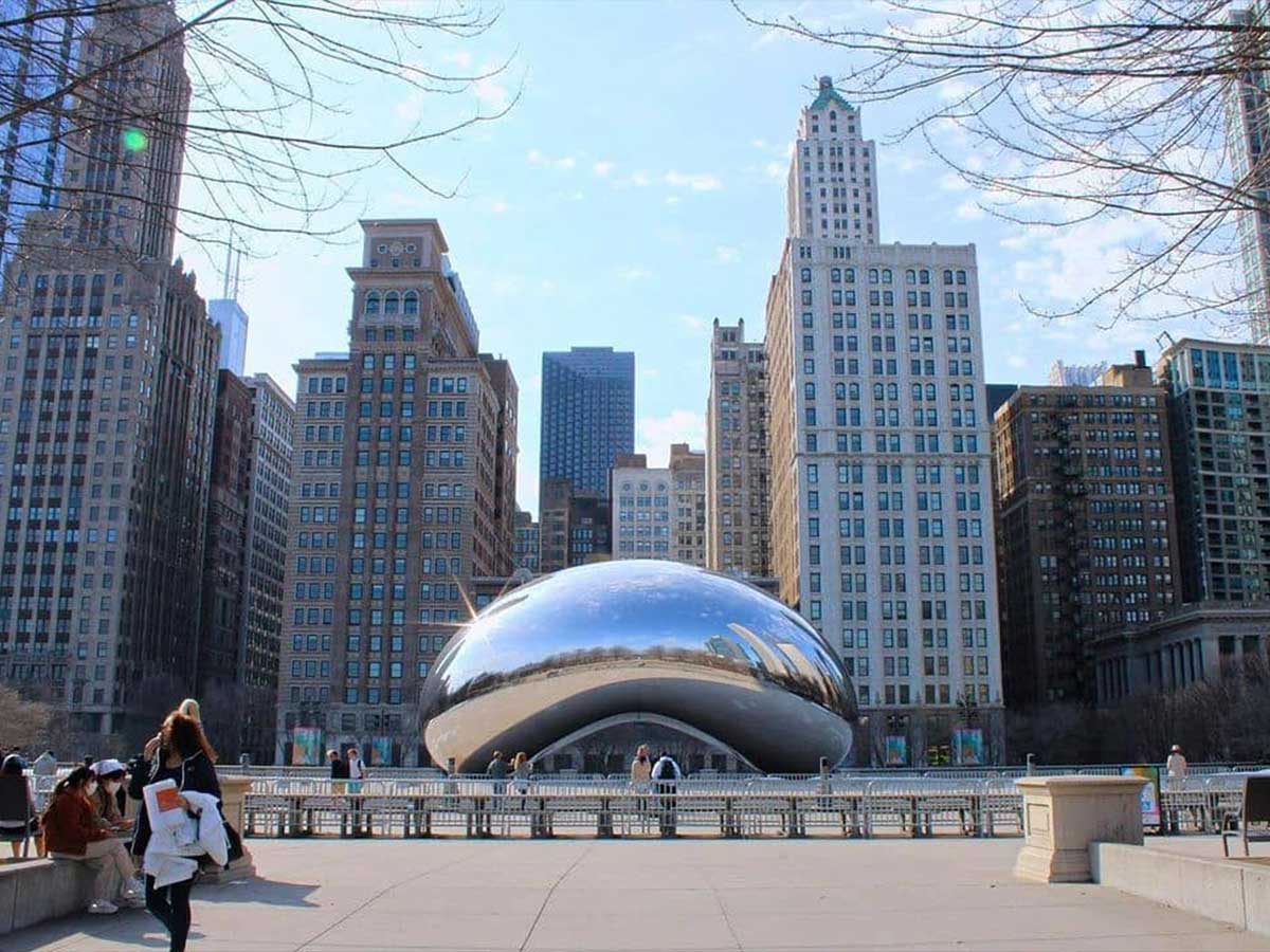 a view of the cloud gate sculpture also known as the bean in millennium park in chicago