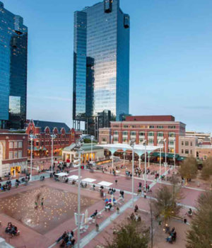 an aerial view of sundance square at dusk