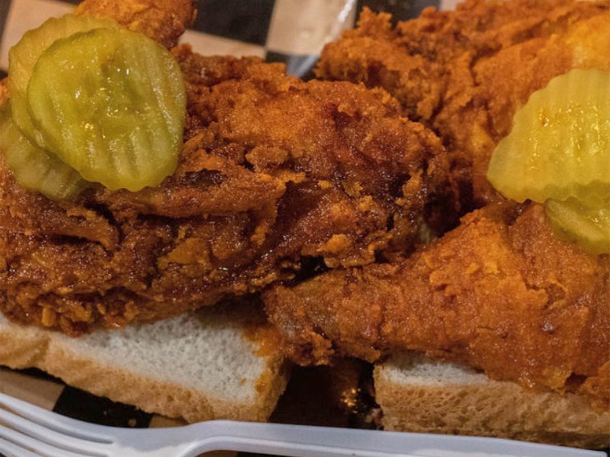 a plate of hot chicken in nashville