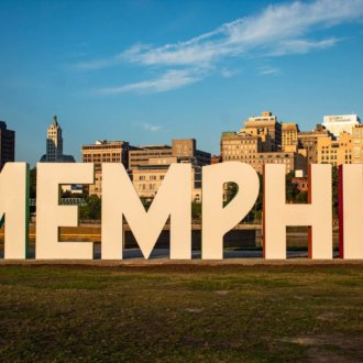 a sign on mud island that says memphis