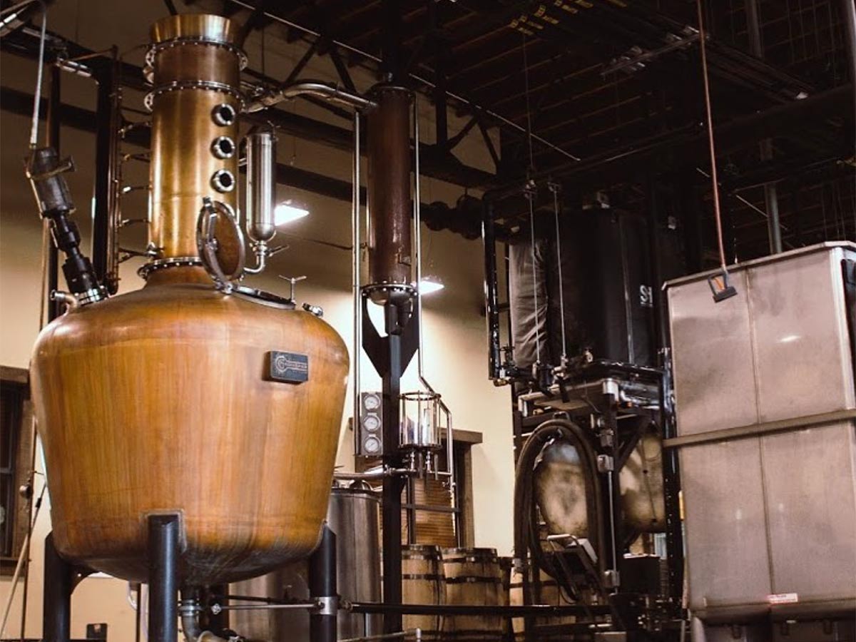 the interior machinery of a whiskey distillery
