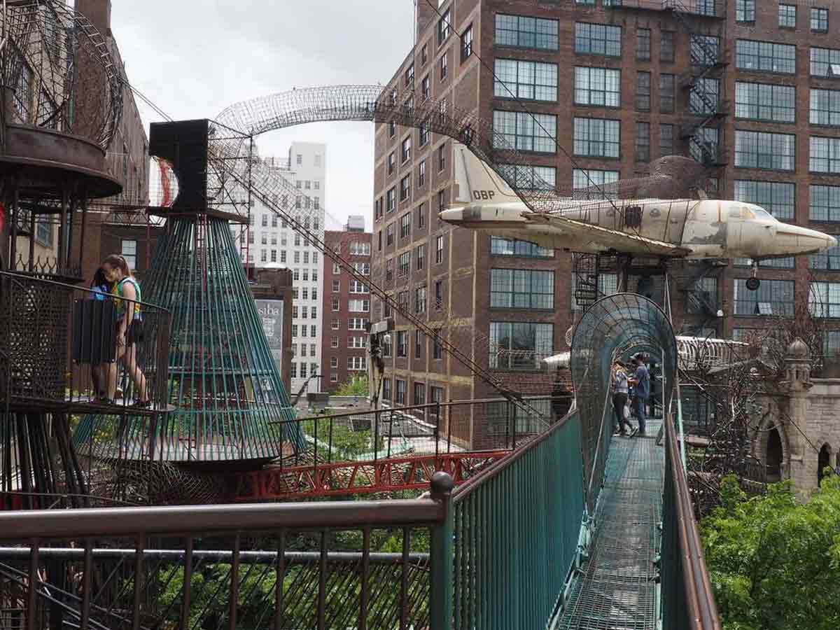 the outdoor portion of the city museum showing walkways and an old frame of an airplane
