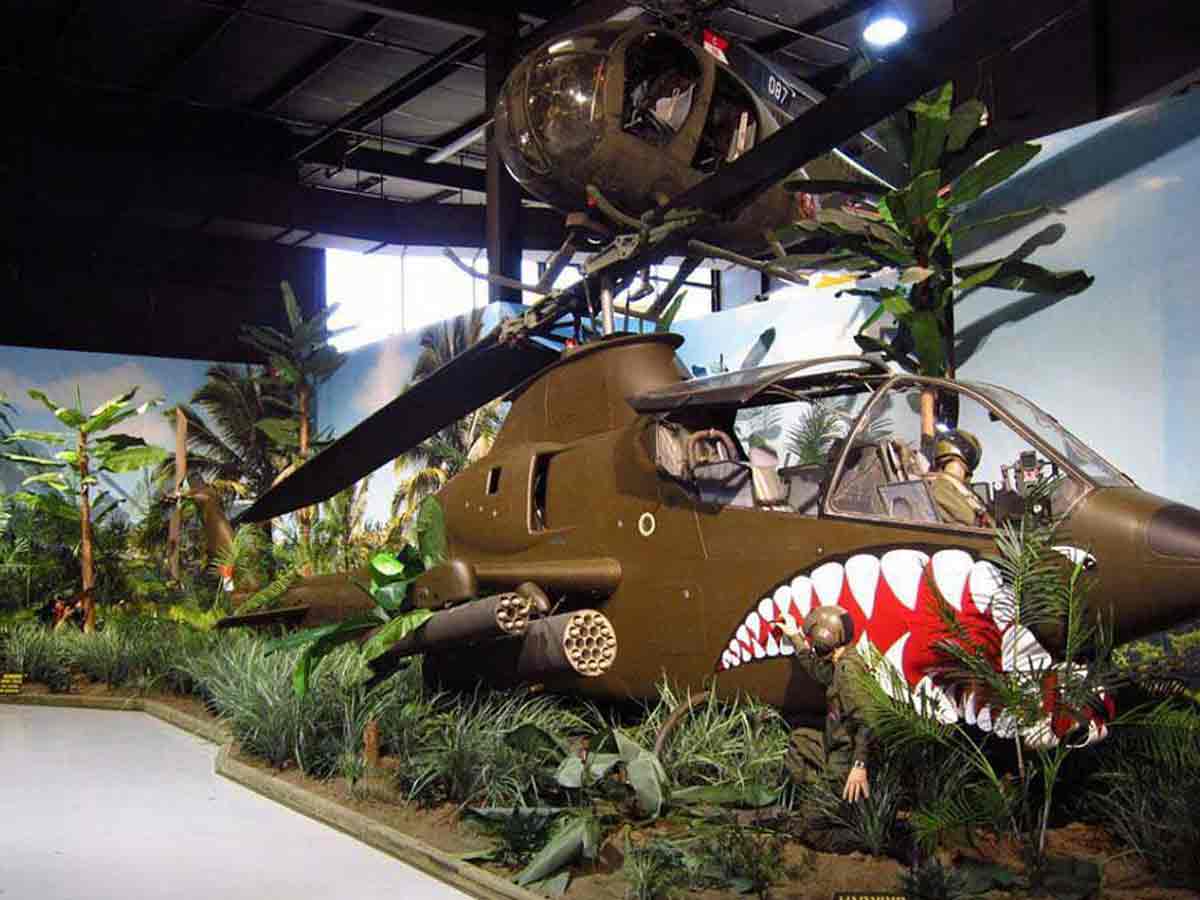 a war helicopter exhibit at the southern museum of flight