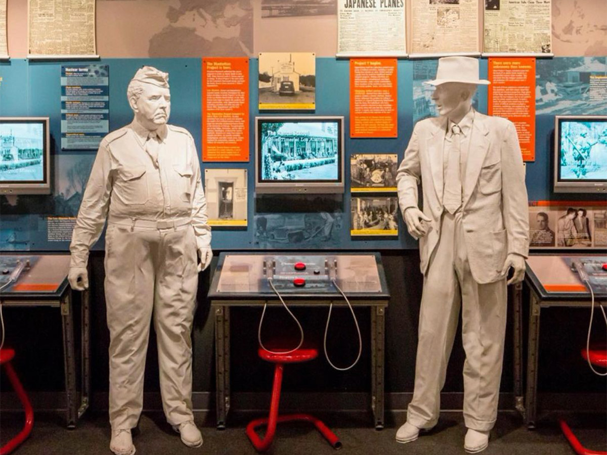 an exhibit with two statues at the bradbury science museum