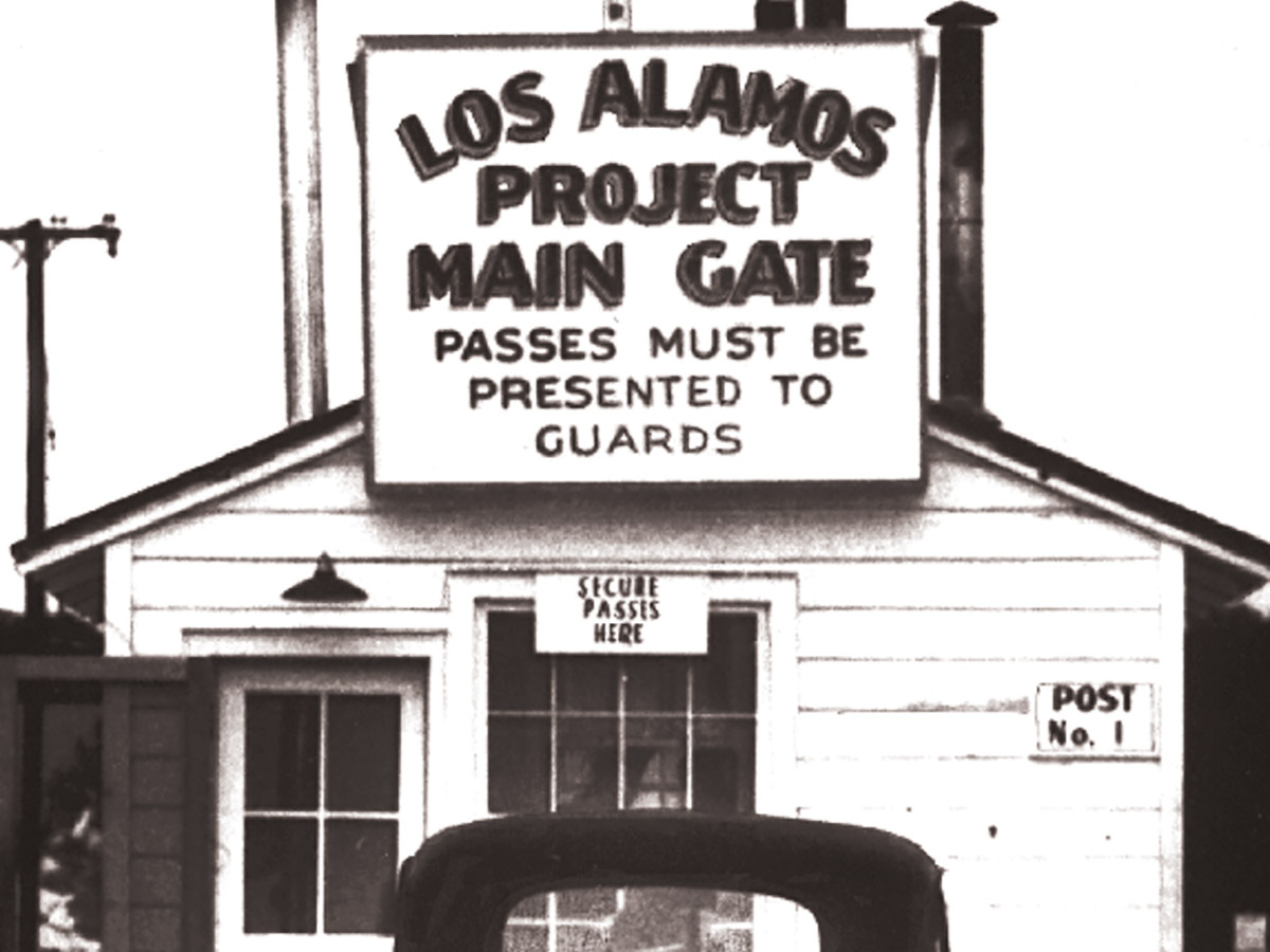 an historic photo showing the main gate to los alamos during the manhattan project