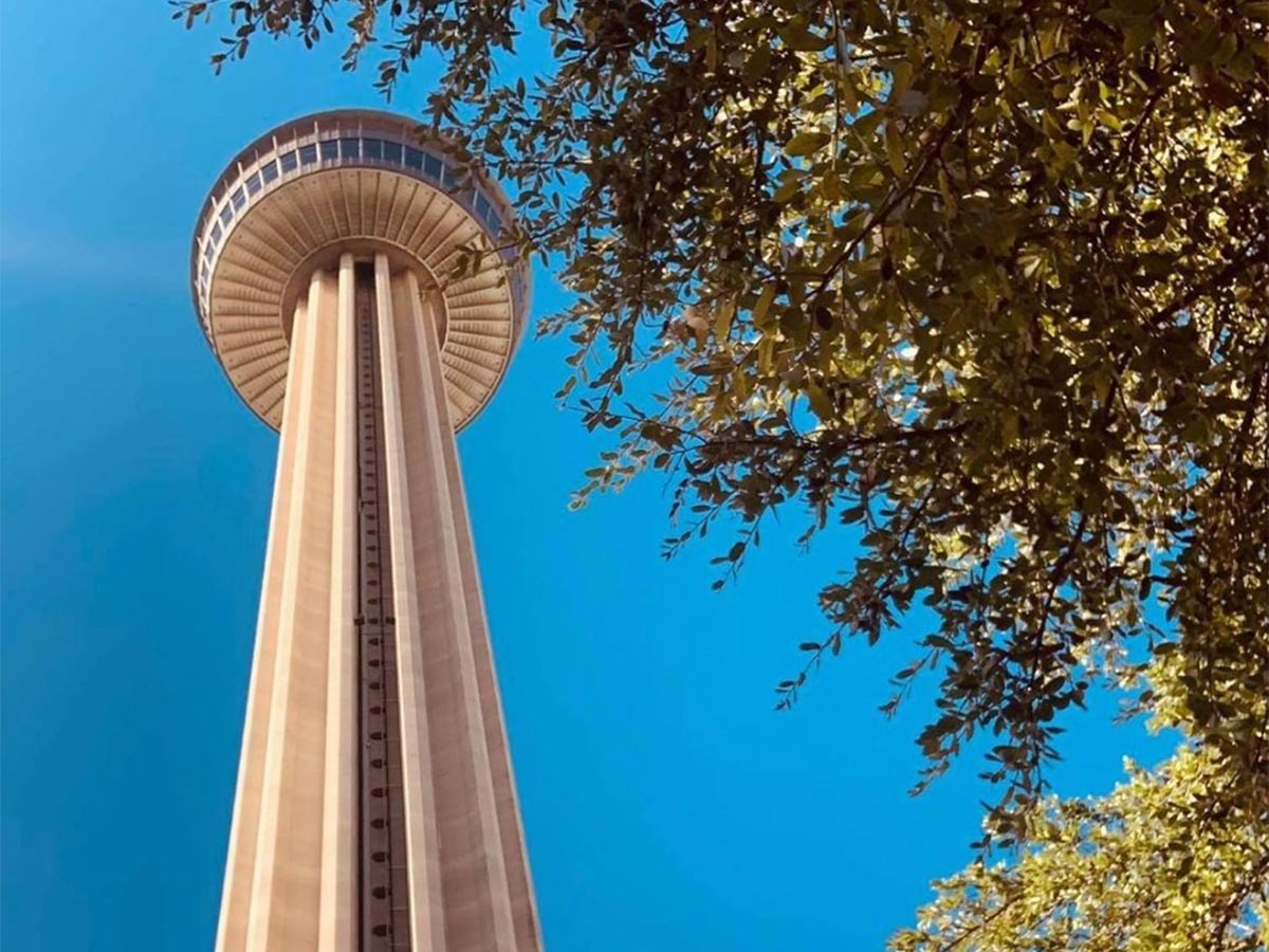 looking up at the tower of the americas from the ground