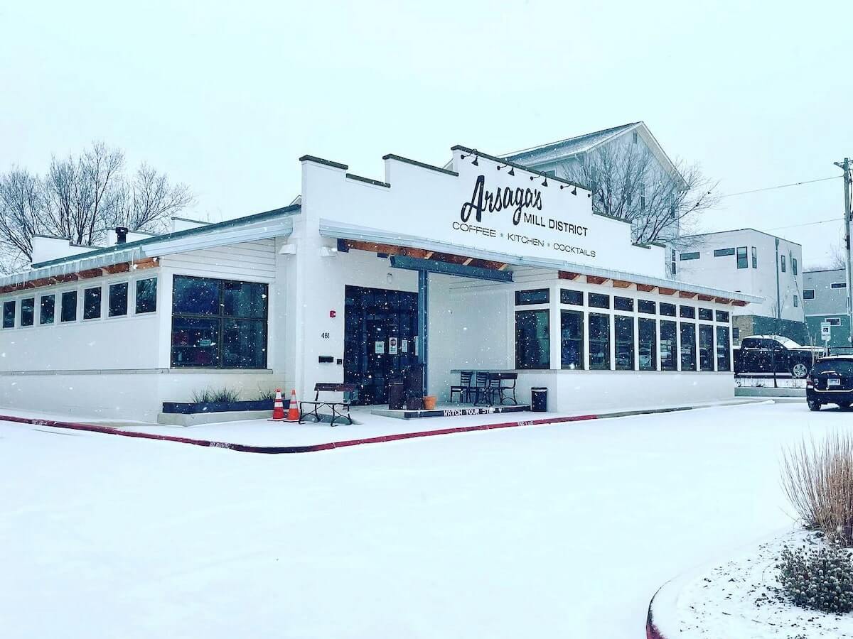 arsaga's mill district cafe covered in snow in fayetteville arkansas