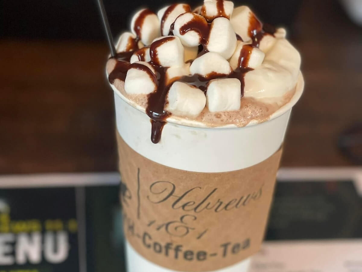 a decadent coffee drink with chocolate sauce and marshmallows at hebrews 11&1 in hope arkansas