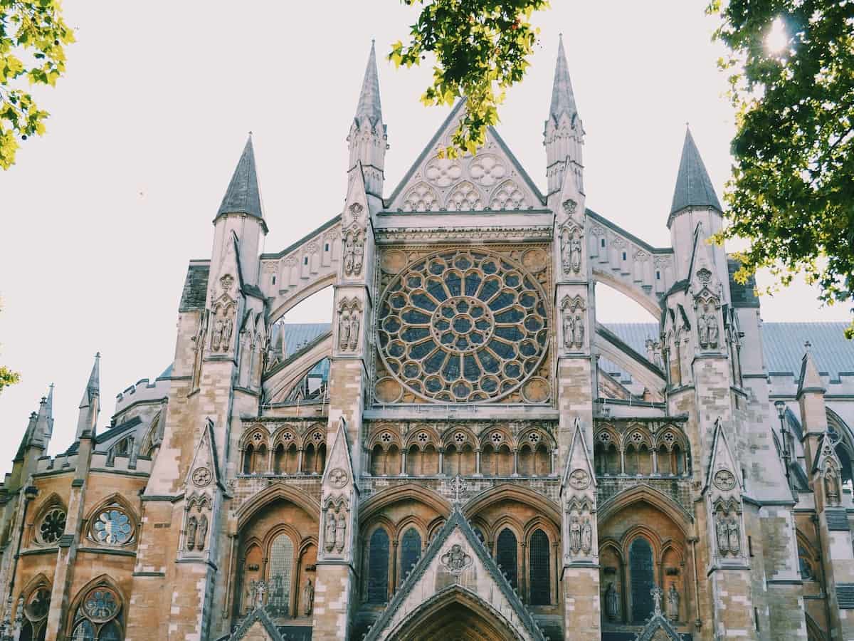 an exterior view of one of the entrances to westminster abbey in london