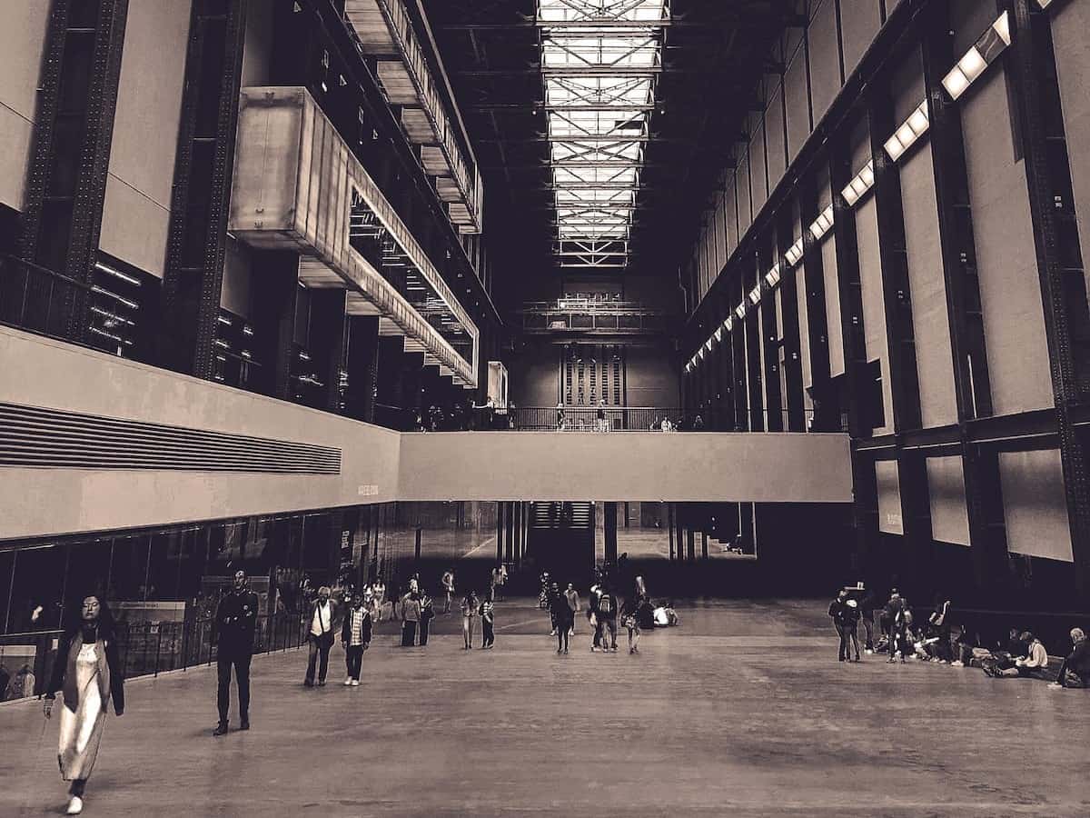 the cavernously large entrance hall of the tate modern in london