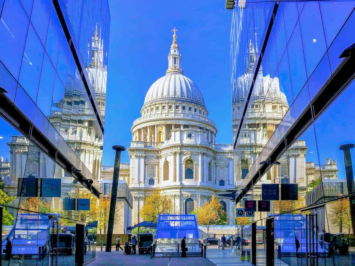 a view from inside one new change toward st pauls cathedral with the building reflected in the glass
