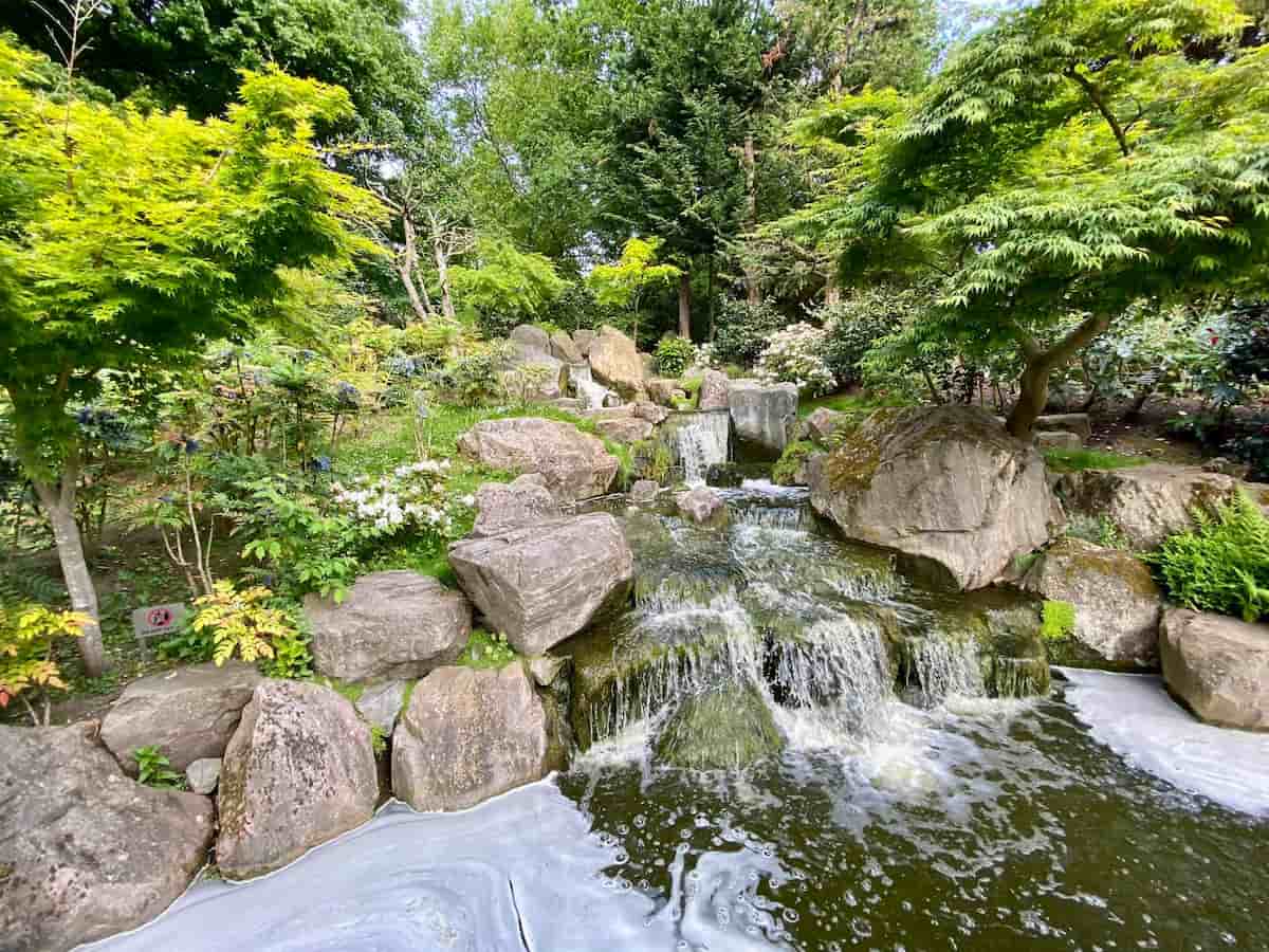a waterfall at the kyoto garden in london