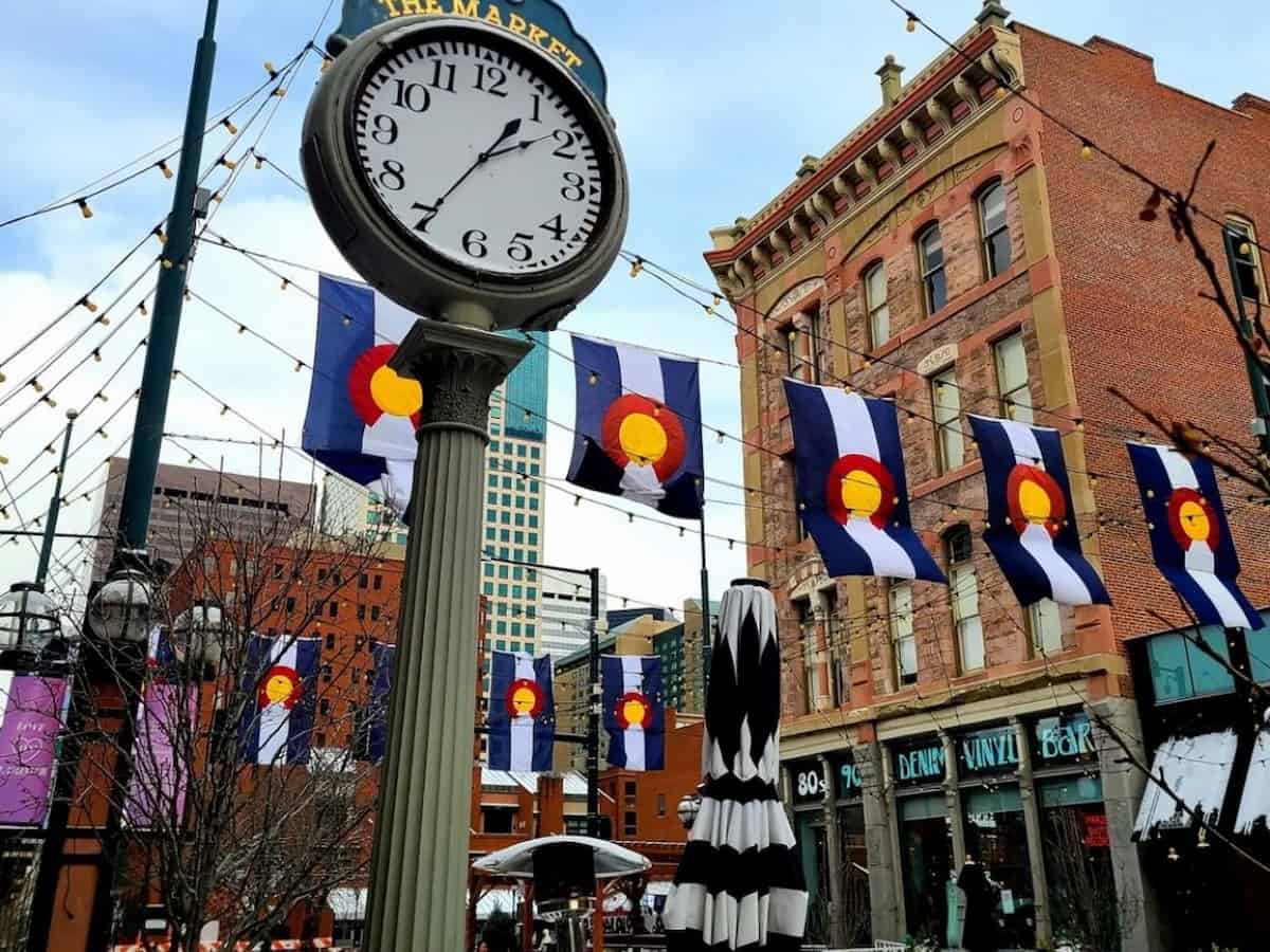colorado flag pennants hang around historic larimer square in downtown denver