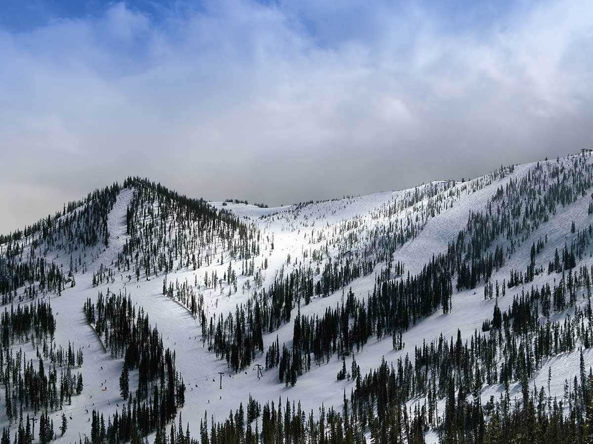 snow covered ski runs at monarch mountain resort