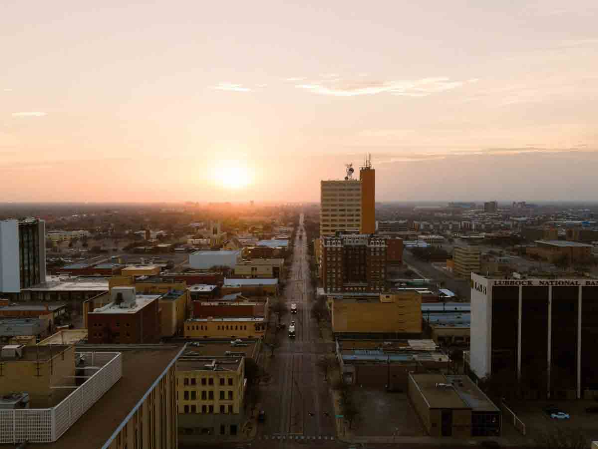 a sunset view of downtown lubbock texas and the depot district