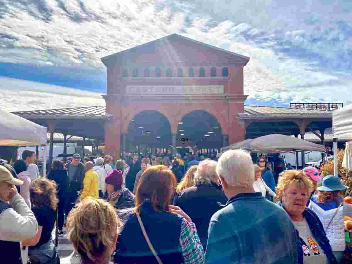 a large crowd explores the offerings at eastern market in detroit michigan
