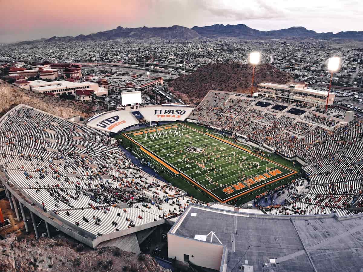an aerial view of the utep sun bowl stadium at sunset