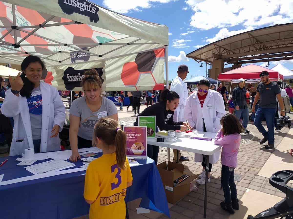children visit different interactive booths at an insights el paso popup event
