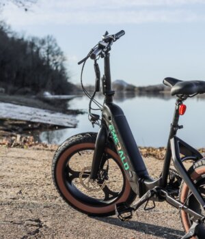 Emerald Ebike parked in front of a river