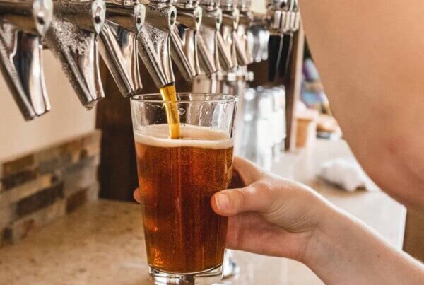 Pouring beer from tap in arkansas