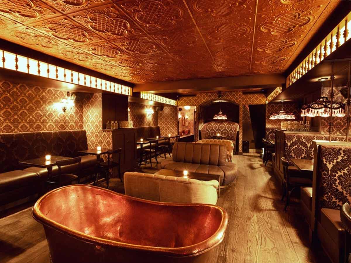 the interior of bathtub gin speakeasy bar in new york city