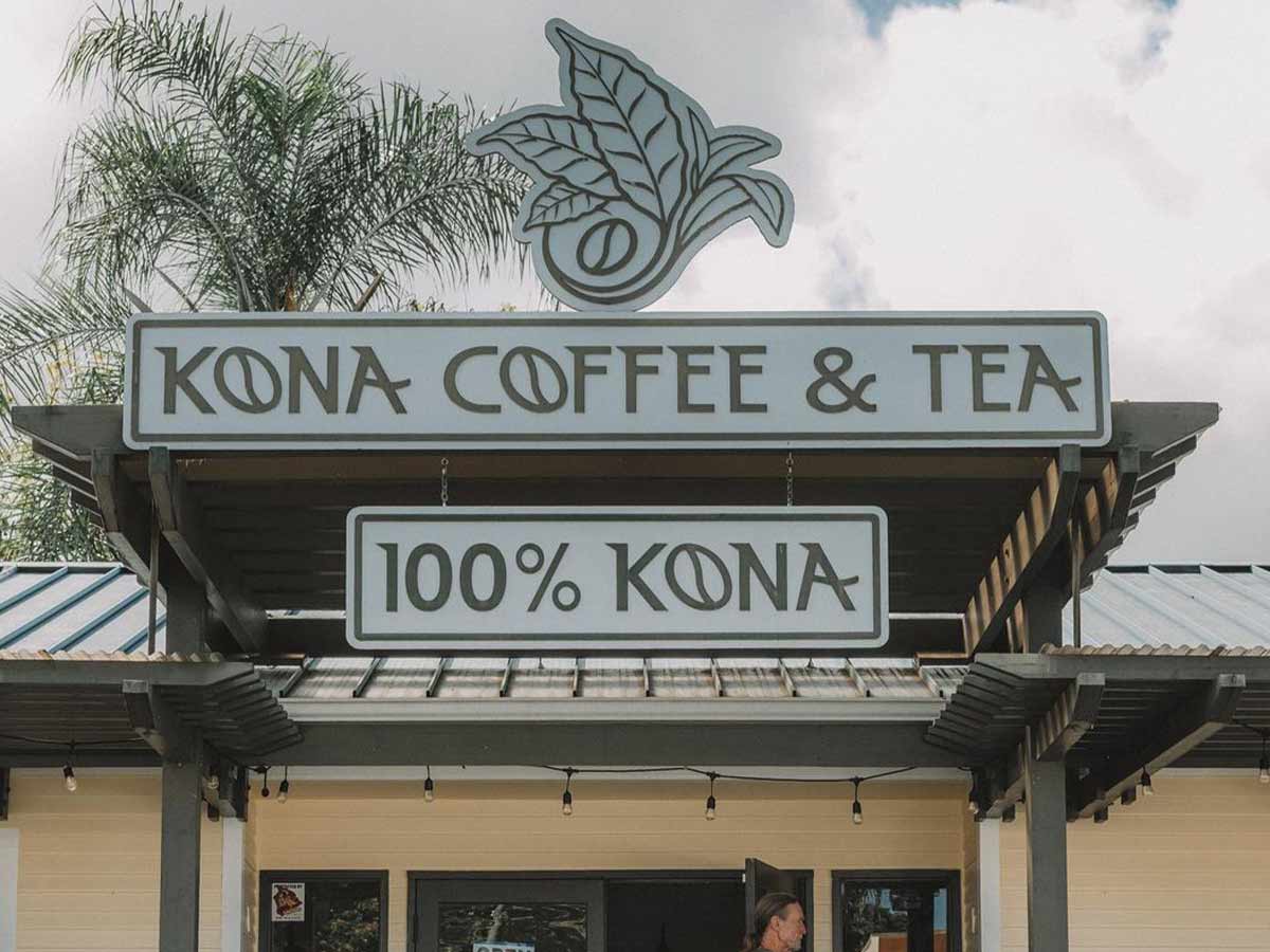 the entrance sign to kona coffee & tea