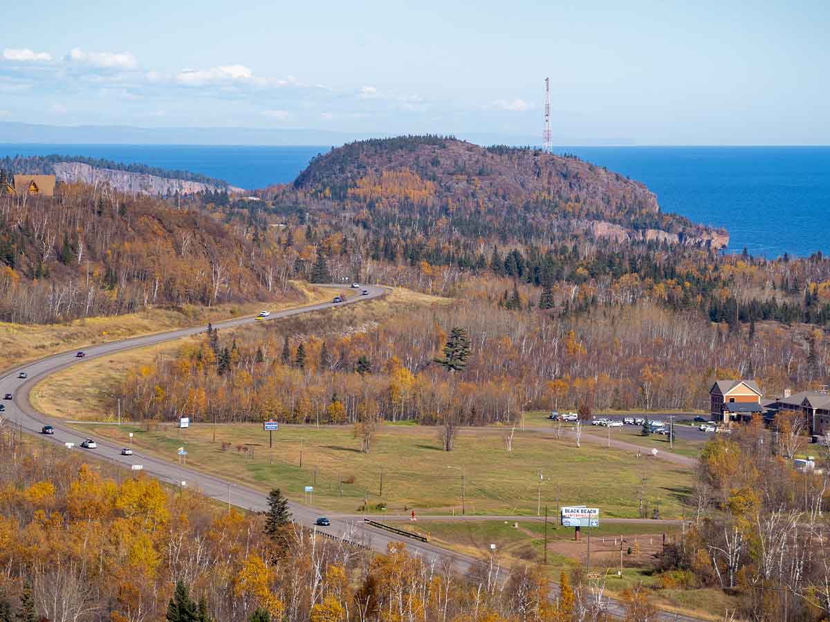 an aerial view of the north shore scenic byway during fall in minnesota