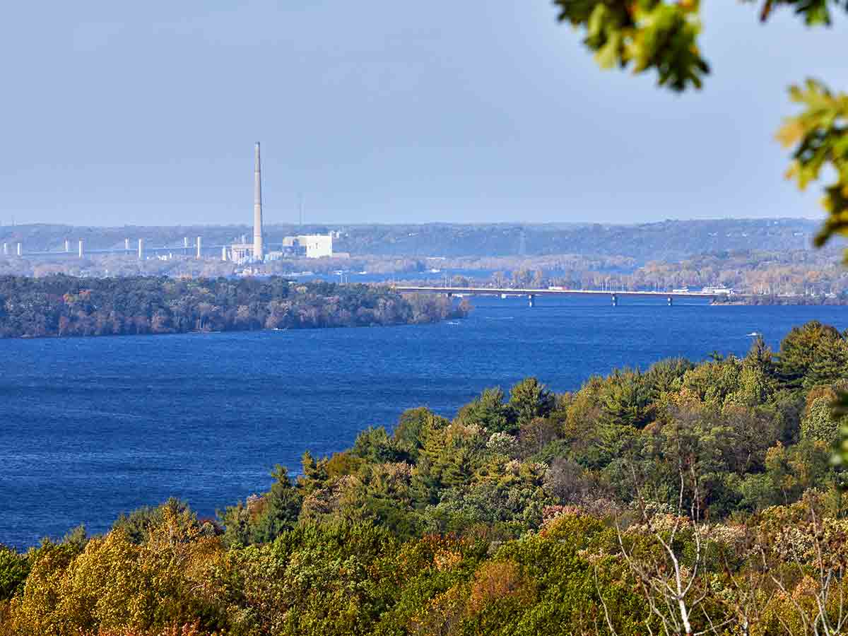 a view of the river and bridge along the st. croix river valley in minnesota
