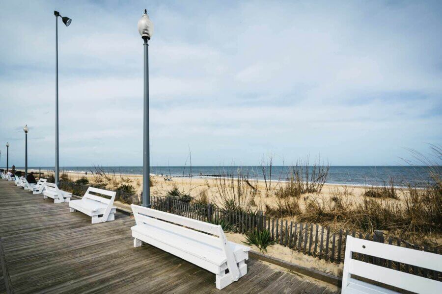 a boardwalk in delaware on the beach
