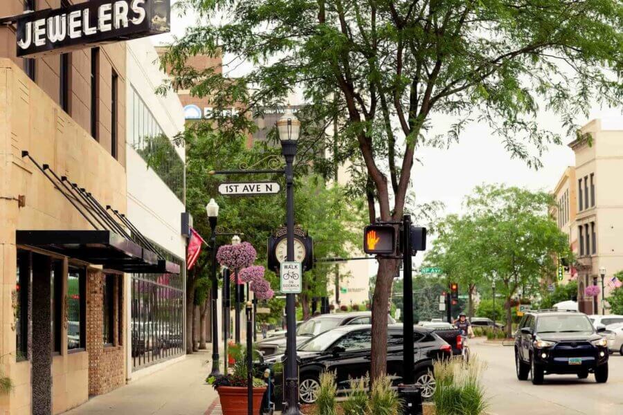a view of a tree-lined street in downtown fargo, north dakota