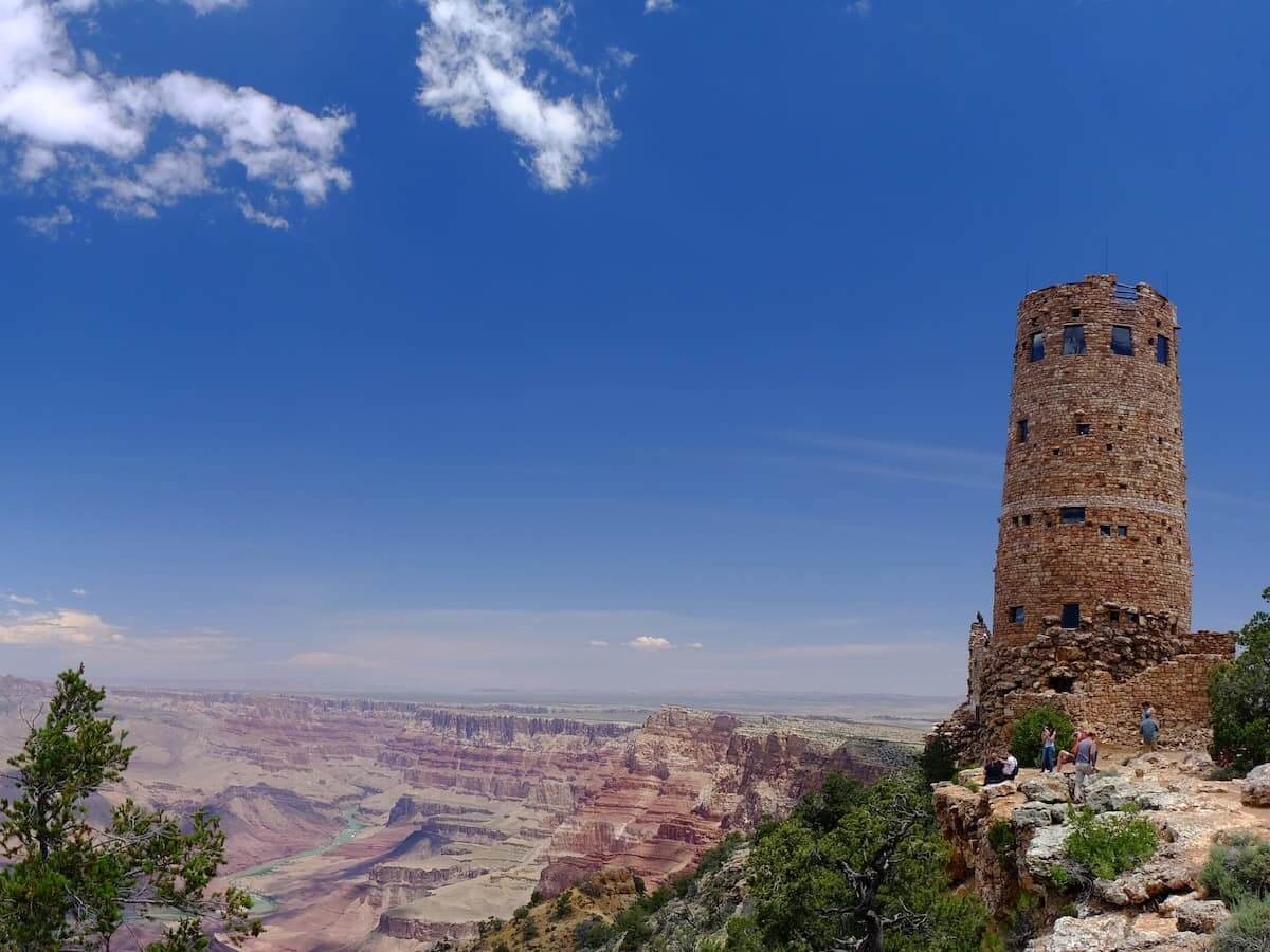 the desert view watchtower historic building looking over the edge of the grand canyon