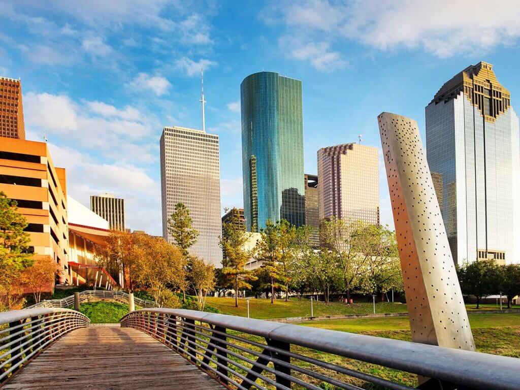 On a bridge in Houston looking at skyscrapers