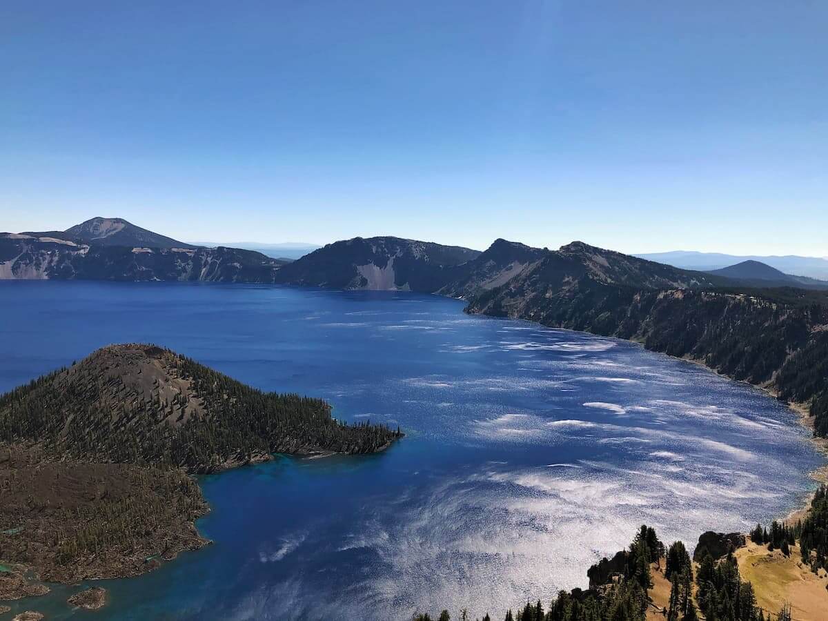 a view of wizard island in crater lake in oregon