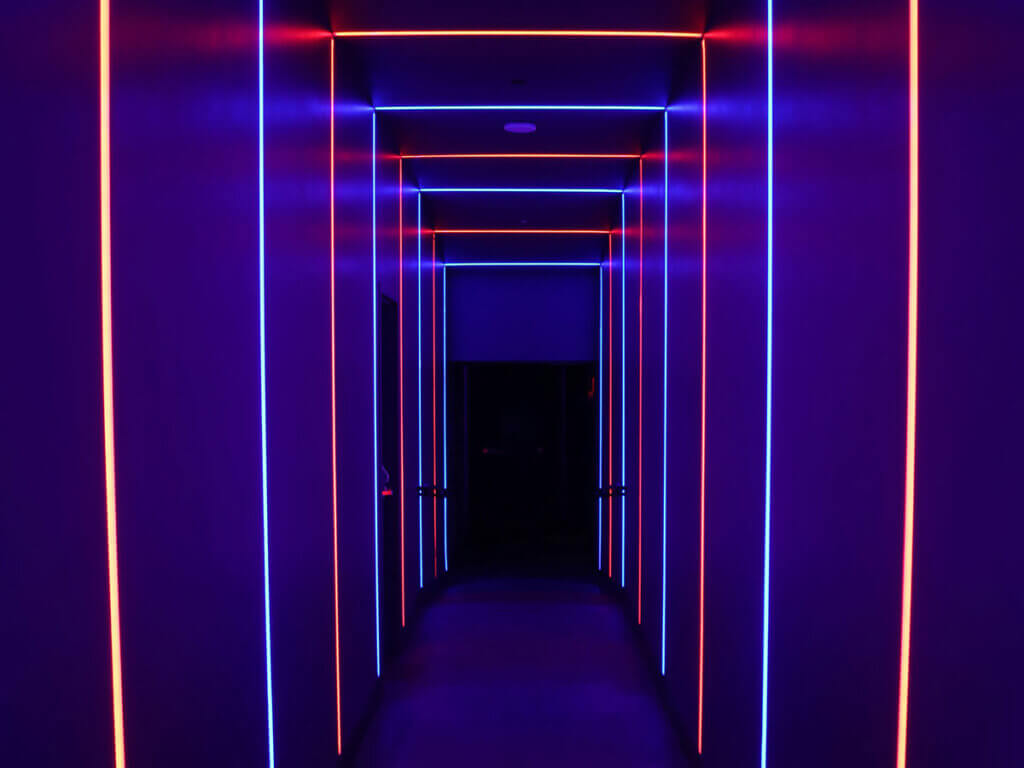 Dark hallway with neon lights at HyperX Arena