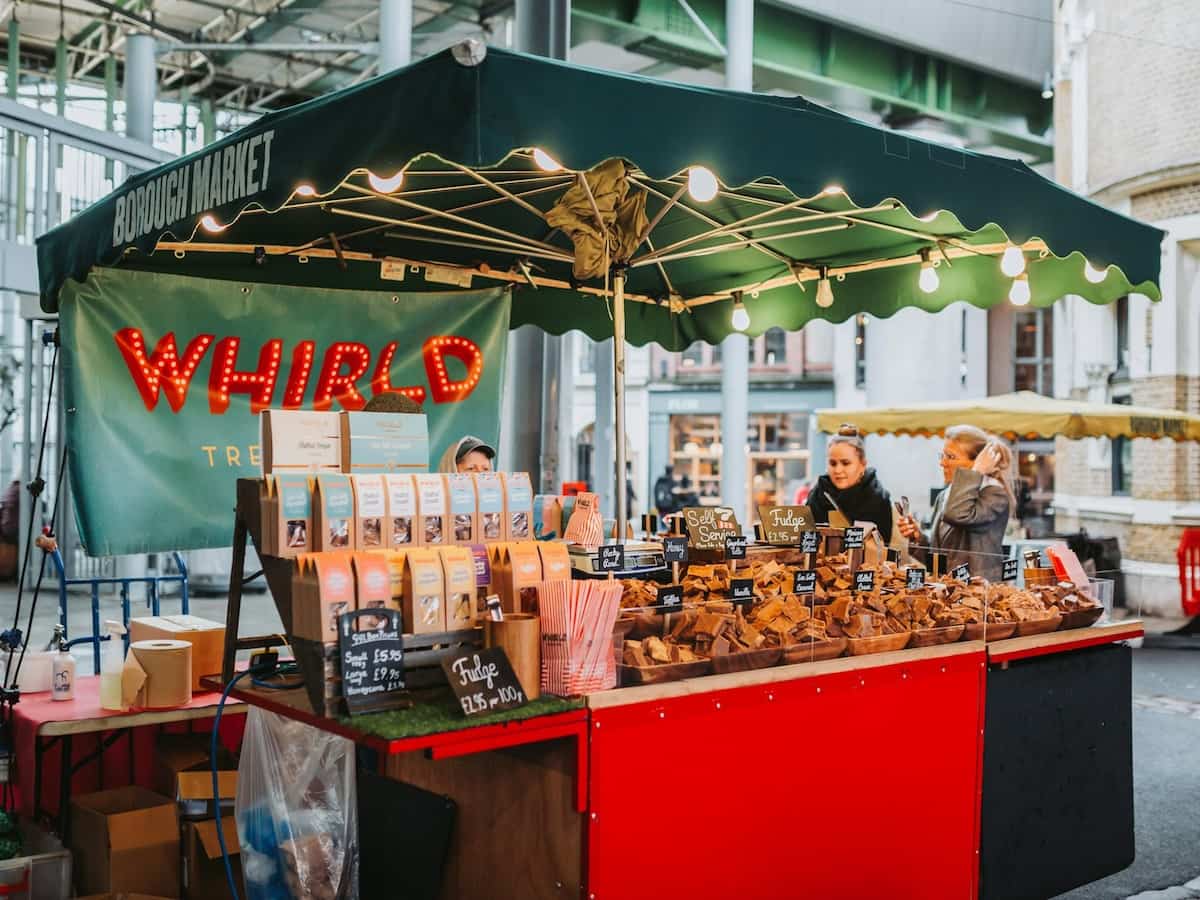 a food stall at borough market in london, england
