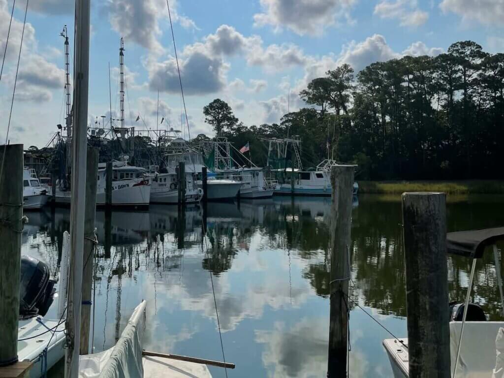 boats in a marina in ocean springs, mississippi